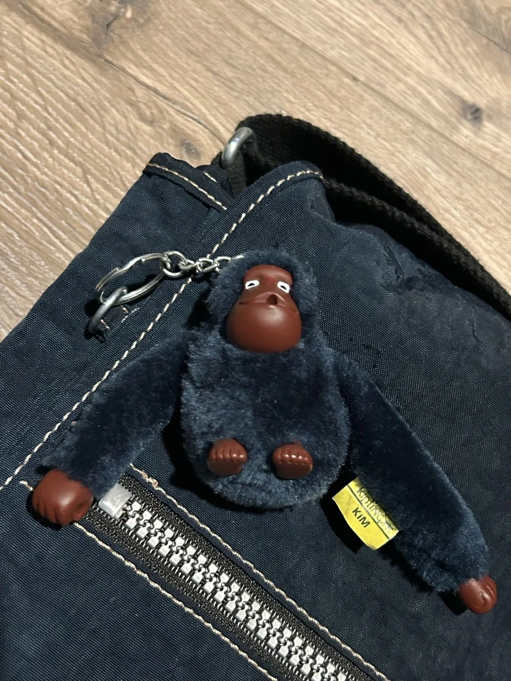 Kipling Dark Blue Expandable Messenger Bag with Monkey Charm